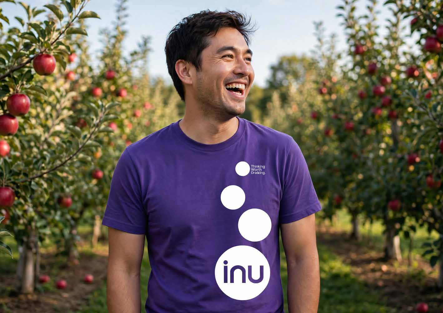 Concept render of a person in an inu t-shirt in an orchard